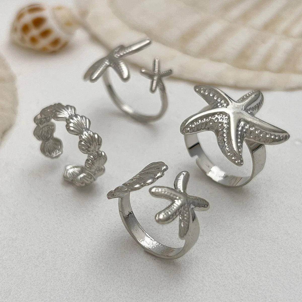 Lot de 4 Bagues Femme – Étoile de Mer & Coquillage Doré