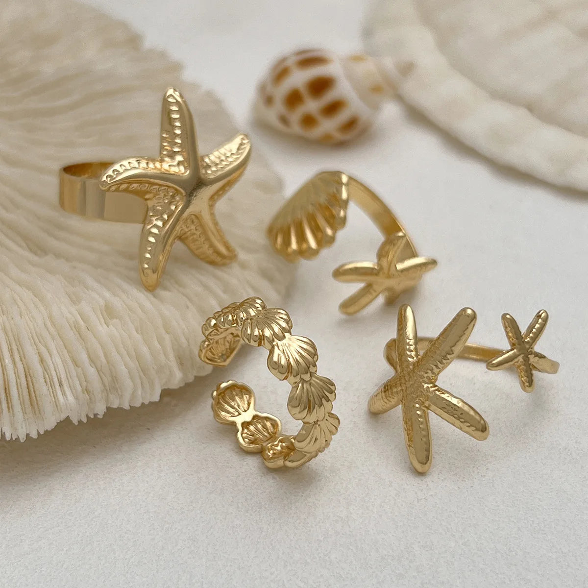 Lot de 4 Bagues Femme – Étoile de Mer & Coquillage Doré